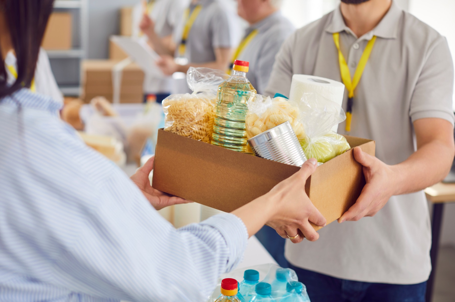 Volunteers packing food donations